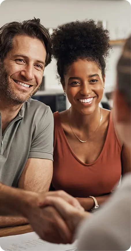 Homeowners meeting with a Pro Source team member