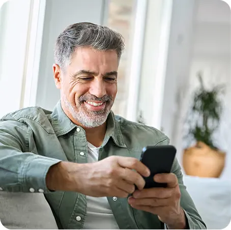 Homeowner reviewing an offer on a phone